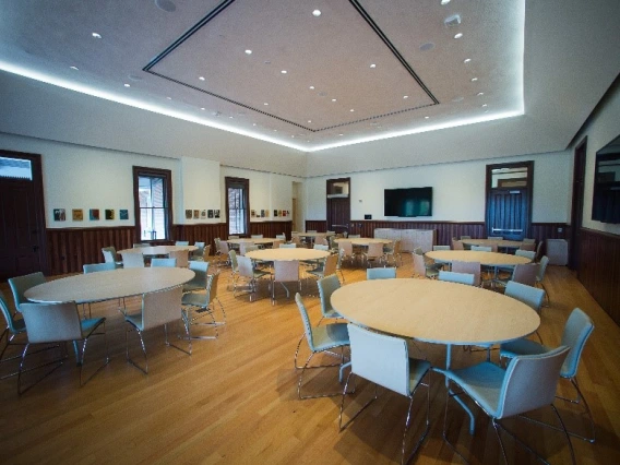 Image of room with multiple round tables